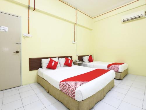 Imagen de la habitación del Hotel OYO 89651 Harmoni, Kota Bharu. Foto 5