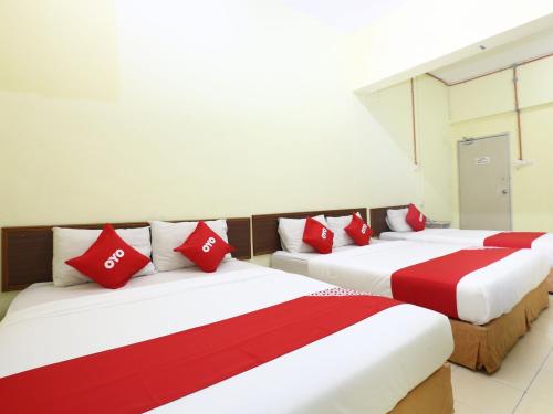 Imagen de la habitación del Hotel OYO 89651 Harmoni, Kota Bharu. Foto 6