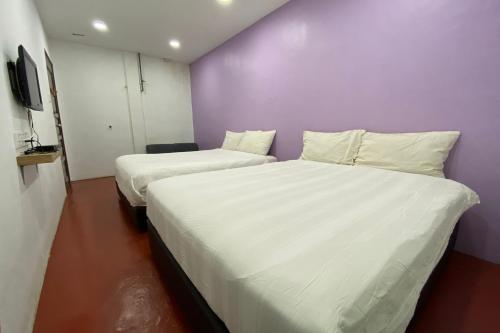 Imagen de la habitación del Hotel OYO 89671 Changlun Star Motel. Foto 5