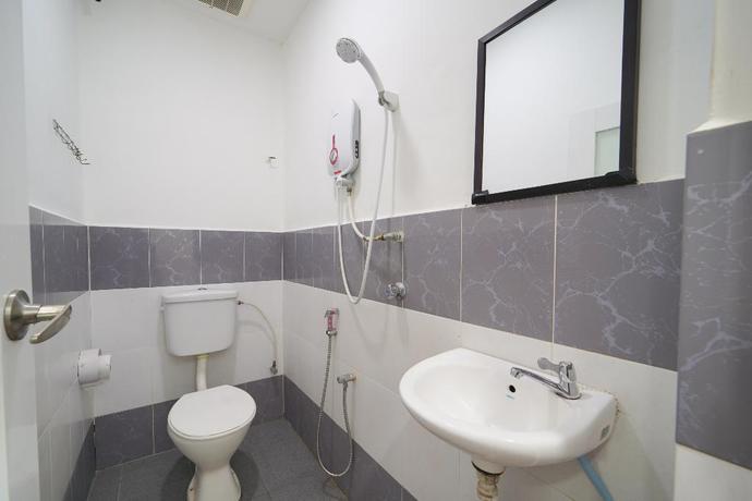 Imagen de la habitación del Hotel OYO 89671 Changlun Star Motel. Foto 7