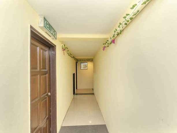 Imagen de los interiores del Hotel OYO 89703 B Link. Foto 14