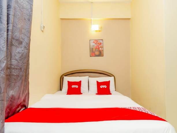 Imagen de la habitación del Hotel OYO 89703 B Link. Foto 4