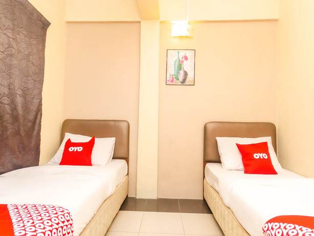 Imagen de la habitación del Hotel OYO 89703 B Link. Foto 10