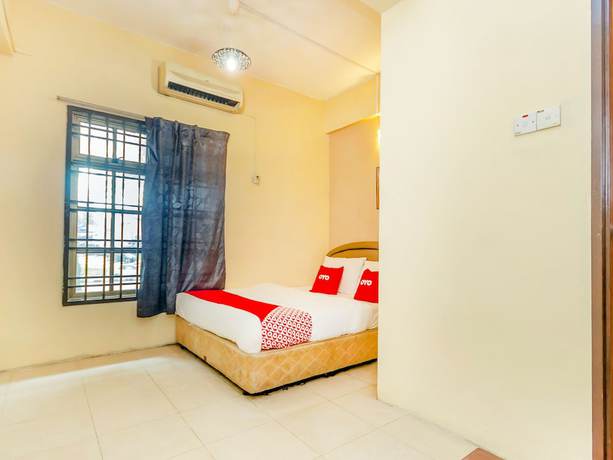 Imagen de la habitación del Hotel OYO 89703 B Link. Foto 11