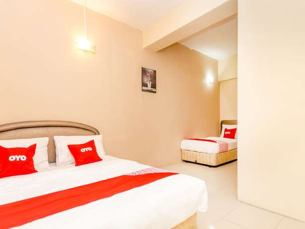 Imagen de la habitación del Hotel OYO 89703 B Link. Foto 13