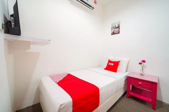 Imagen de la habitación del Hotel OYO 89710 Saujana CT View. Foto 12
