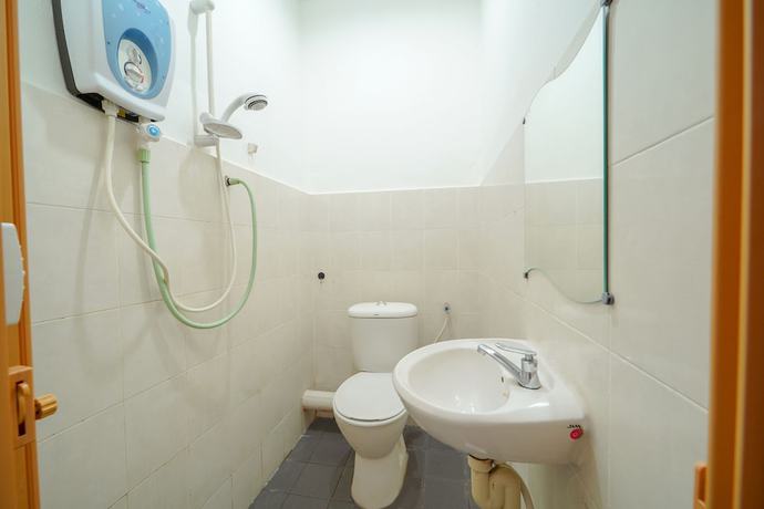 Imagen de la habitación del Hotel OYO 89710 Saujana CT View. Foto 18