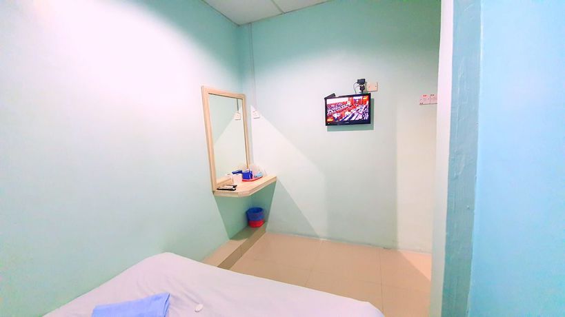 Imagen de la habitación del Hotel OYO 89737 Tishoa. Foto 2