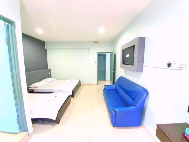 Imagen de la habitación del Hotel OYO 89737 Tishoa. Foto 3