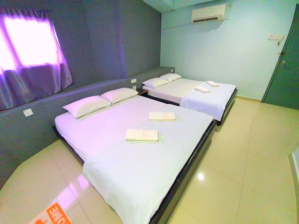 Imagen de la habitación del Hotel OYO 89737 Tishoa. Foto 4