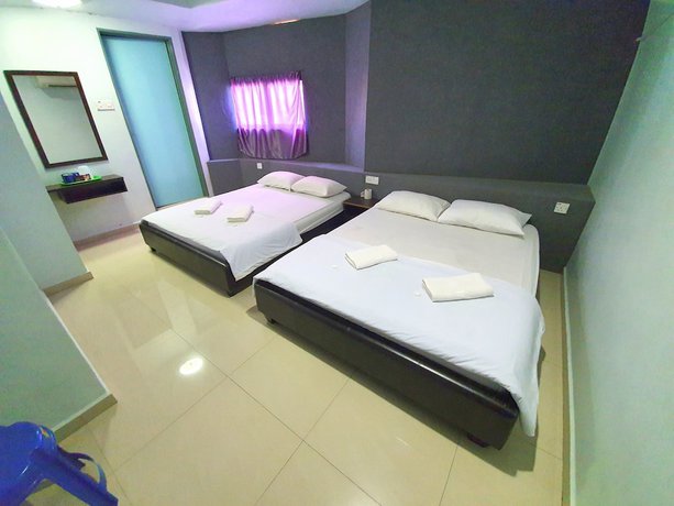 Imagen de la habitación del Hotel OYO 89737 Tishoa. Foto 6