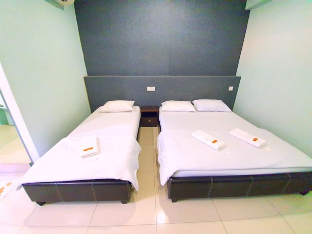 Imagen de la habitación del Hotel OYO 89737 Tishoa. Foto 7