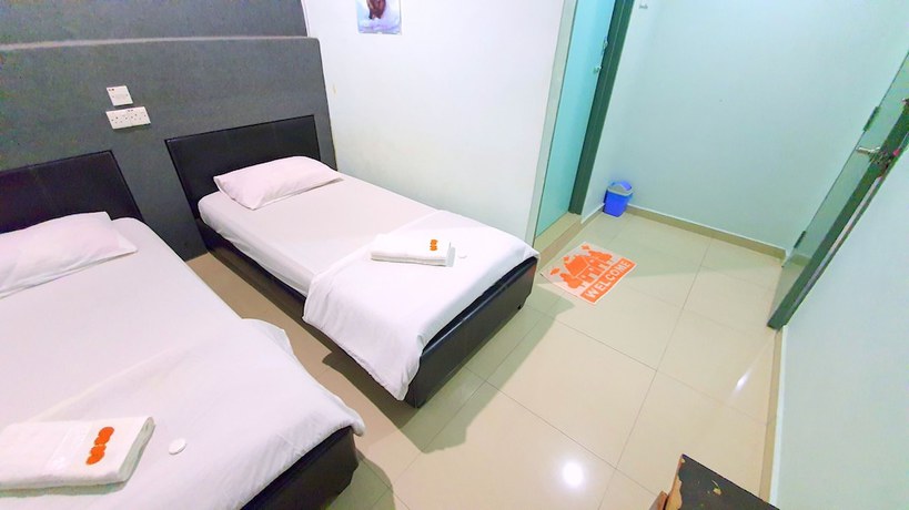 Imagen de la habitación del Hotel OYO 89737 Tishoa. Foto 9