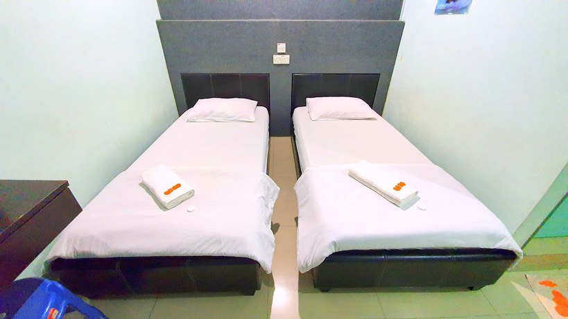 Imagen de la habitación del Hotel OYO 89737 Tishoa. Foto 10