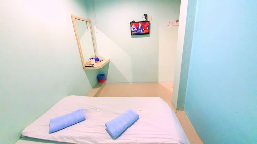 Imagen de la habitación del Hotel OYO 89737 Tishoa. Foto 15