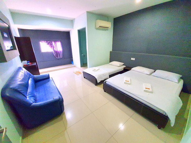 Imagen de la habitación del Hotel OYO 89737 Tishoa. Foto 16