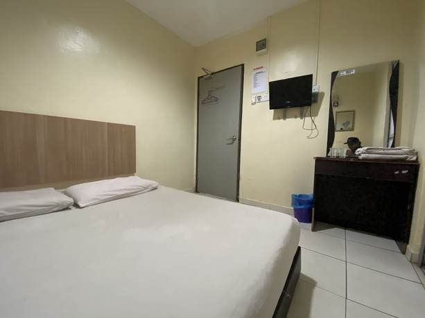 Imagen de la habitación del Hotel OYO 89760 Harmoni Inn. Foto 5