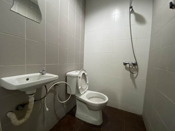 Imagen de la habitación del Hotel OYO 89760 Harmoni Inn. Foto 6