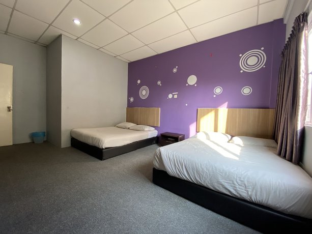 Imagen de la habitación del Hotel OYO 89760 Harmoni Inn. Foto 10