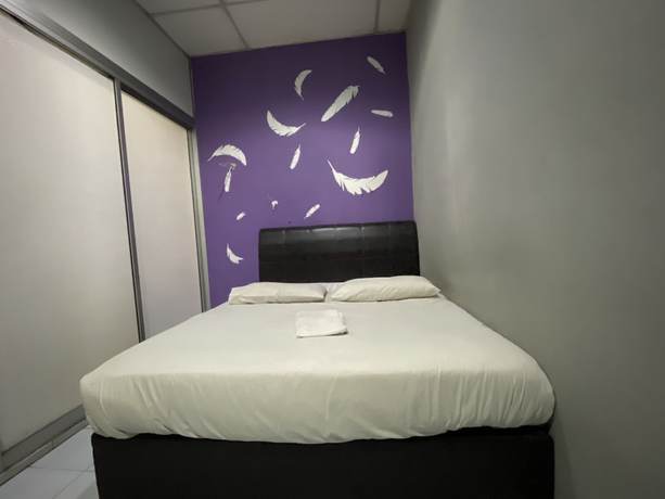 Imagen de la habitación del Hotel OYO 89760 Harmoni Inn. Foto 12