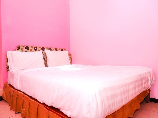 Imagen de la habitación del Hotel OYO 898 Joglo Family and Homestay. Foto 5