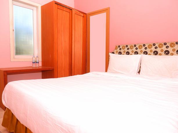 Imagen de la habitación del Hotel OYO 898 Joglo Family and Homestay. Foto 11