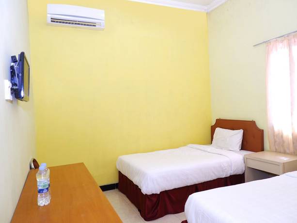 Imagen de la habitación del Hotel OYO 898 Joglo Family and Homestay. Foto 13
