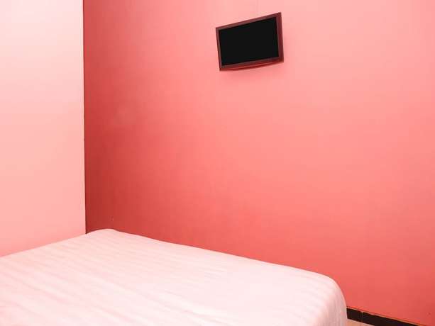 Imagen de la habitación del Hotel OYO 898 Joglo Family and Homestay. Foto 15