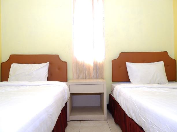 Imagen de la habitación del Hotel OYO 898 Joglo Family and Homestay. Foto 16