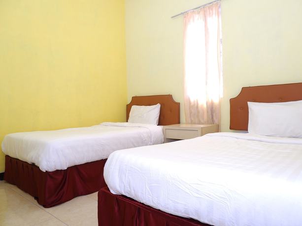 Imagen de la habitación del Hotel OYO 898 Joglo Family and Homestay. Foto 17