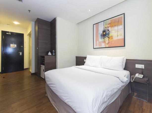 Imagen de la habitación del Hotel OYO 89820 SP Berlian Inn. Foto 5