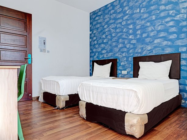 Imagen de la habitación del Hotel OYO 89840 69 Room 4 Stay. Foto 5