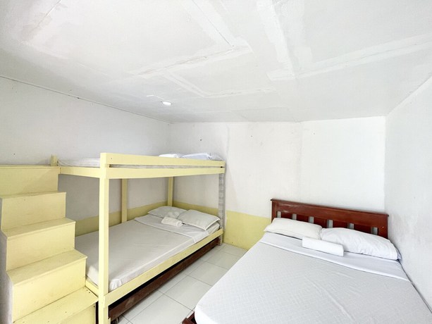 Imagen de la habitación del Hotel OYO 899 Merie Diz Sunrise Beach Resort. Foto 6