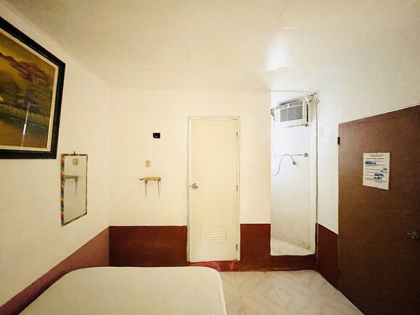 Imagen de la habitación del Hotel OYO 899 Merie Diz Sunrise Beach Resort. Foto 9