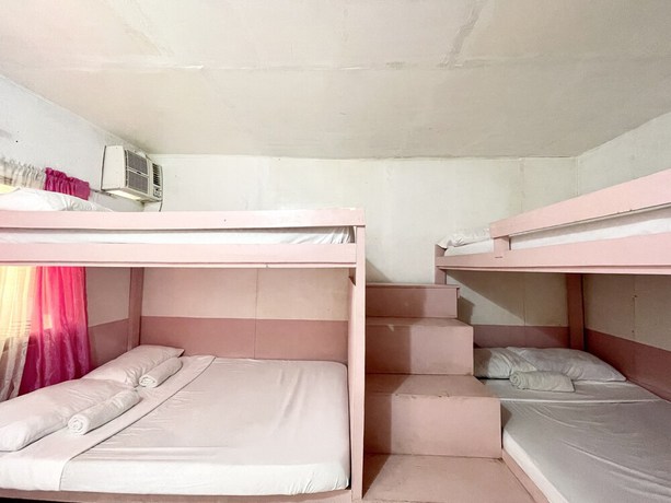 Imagen de la habitación del Hotel OYO 899 Merie Diz Sunrise Beach Resort. Foto 10