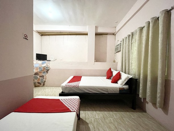 Imagen de la habitación del Hotel OYO 899 Merie Diz Sunrise Beach Resort. Foto 11