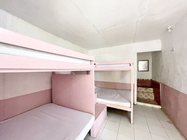 Imagen de la habitación del Hotel OYO 899 Merie Diz Sunrise Beach Resort. Foto 12