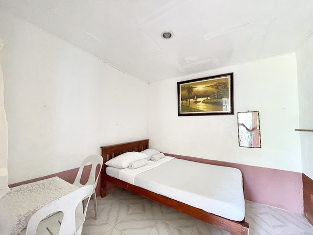 Imagen de la habitación del Hotel OYO 899 Merie Diz Sunrise Beach Resort. Foto 14