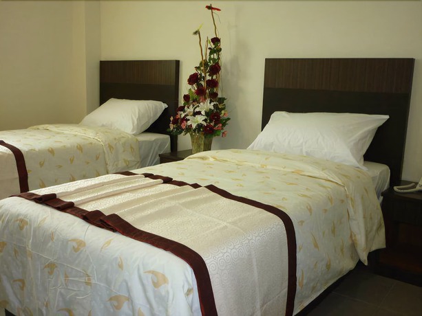 Imagen de la habitación del Hotel OYO 89948 Hotel Masai Utama. Foto 2