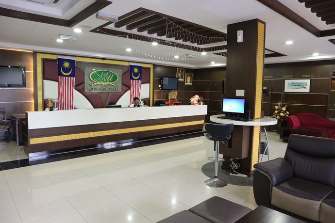 Imagen de los interiores del Hotel OYO 89948 Hotel Masai Utama. Foto 11
