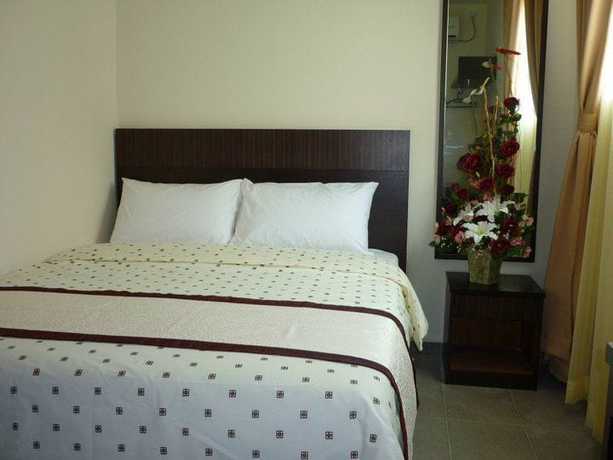 Imagen de la habitación del Hotel OYO 89948 Hotel Masai Utama. Foto 7