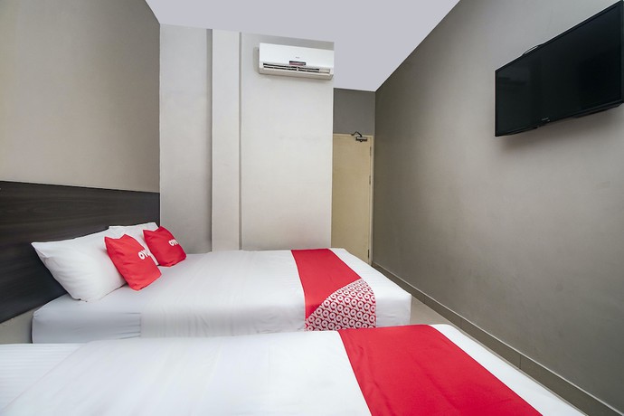 Imagen de la habitación del Hotel OYO 89959 Nice Stay Three Six Five Services. Foto 12