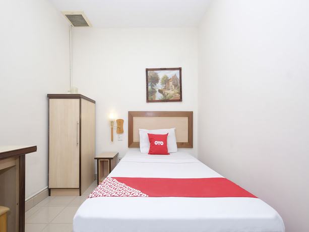 Imagen de la habitación del Hotel OYO 89968 Sri Sutra. Foto 9