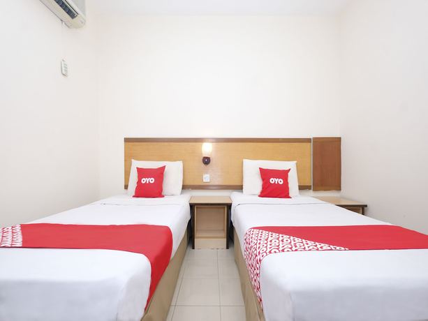 Imagen de la habitación del Hotel OYO 89968 Sri Sutra. Foto 11
