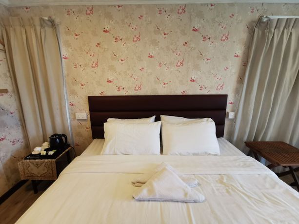 Imagen de la habitación del Hotel OYO 89969 Mount Hill Villa Kundasang. Foto 13