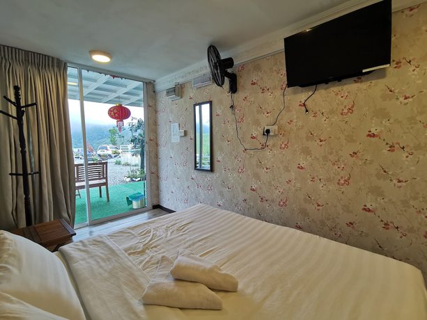 Imagen de la habitación del Hotel OYO 89969 Mount Hill Villa Kundasang. Foto 11