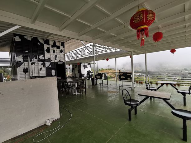 Imagen del bar/restaurante del Hotel OYO 89969 Mount Hill Villa Kundasang. Foto 7