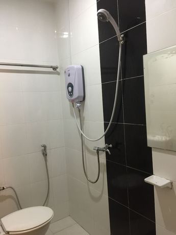Imagen de la habitación del Hotel OYO 89976 Fins. Foto 5