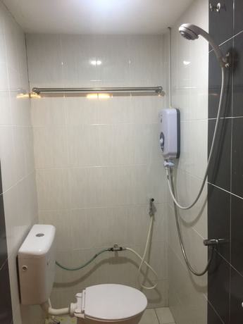 Imagen de la habitación del Hotel OYO 89976 Fins. Foto 11