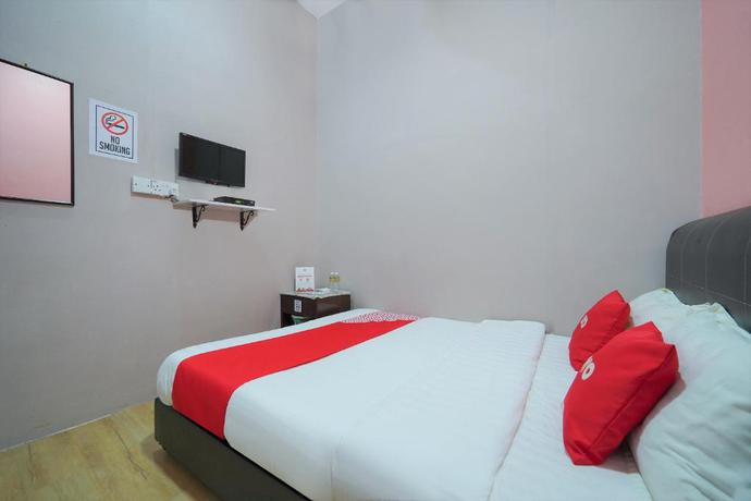 Imagen de la habitación del Hotel OYO 89982 Familia motel. Foto 5